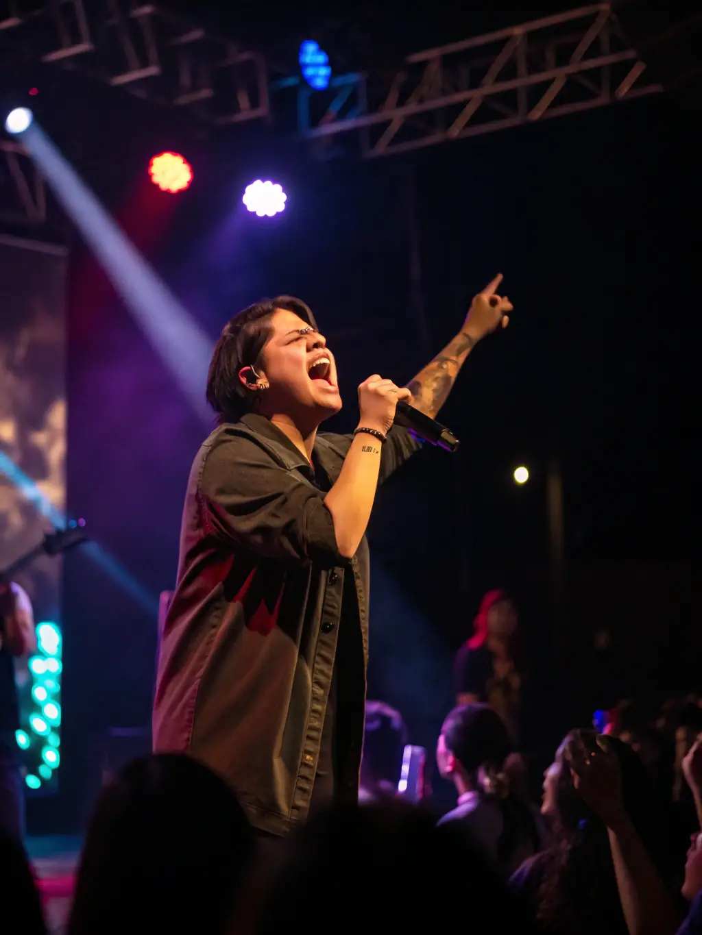 A photo capturing a live performance event supported by ANODINE CREATIVE RECORDS, highlighting the energy and talent of emerging artists.